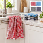 Kitchen towels stored beside a sink