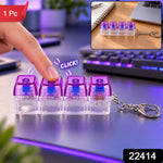 A hand presses a purple and clear four-key keyboard switch keychain, with a smaller inset image on a desk and a "1 Pc" label.