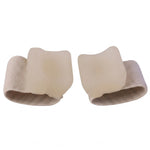 Two beige elastic toe separators with clear gel pads, viewed from the front, against a plain white background.