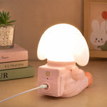 Night lamp holding a smartphone on a study table