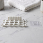 Plastic soap rack and adhesive mount view