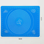 Durable silicone mat being folded to demonstrate its flexibility and ease of storage.