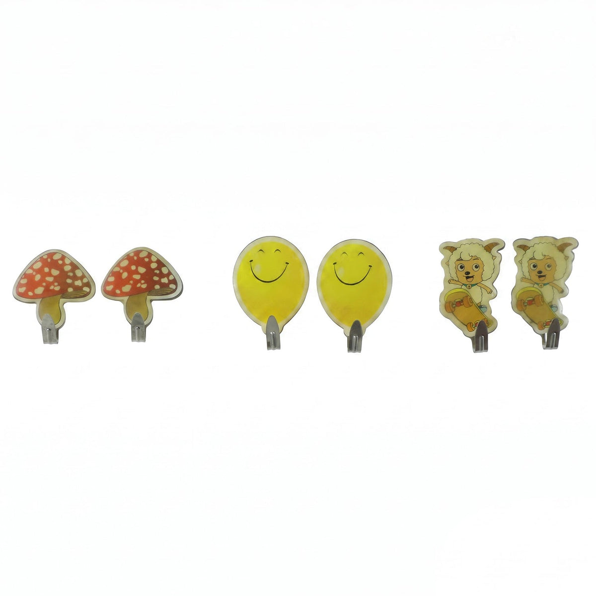 Six assorted cartoon wall hooks: two red mushrooms, two yellow smiling faces, and two sheep on skateboards, against a white