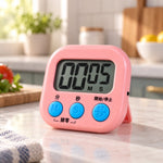 Close up of digital kitchen timer buttons M S Start Stop