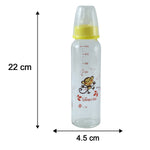 A clear glass baby bottle with a yellow nipple and monkey design is shown with its height and width measurements.