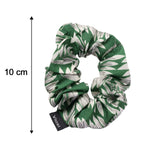 A green and white leaf print scrunchie with a 'viosi' tag is shown on a white background with a 10 cm measurement indicator.