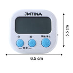 A white digital kitchen timer with blue buttons is displayed on a desk with text highlighting its features like a large