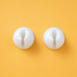Wall mounted toothbrush clip use
