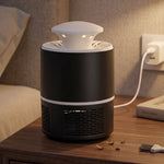 Black and white mosquito killer lamp on a bedside table with dead mosquitoes and a cleaning brush, with an inset image of
