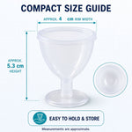 A single transparent eye wash cup with measurement lines indicating an approximate 4 cm rim width and 5.3 cm height.