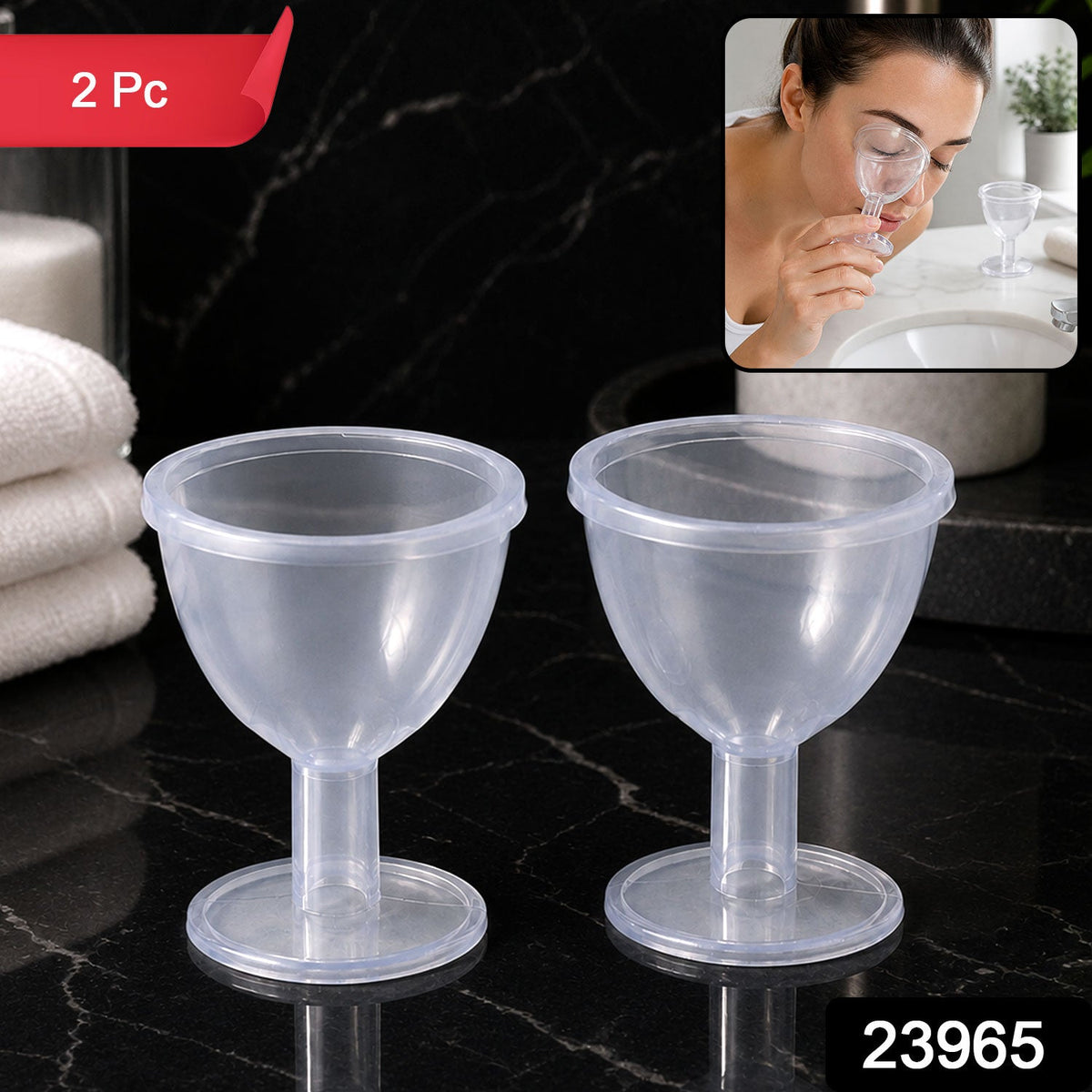 Two clear plastic eye wash cups on a dark marble counter, with a small inset showing a woman using one. The image has a red