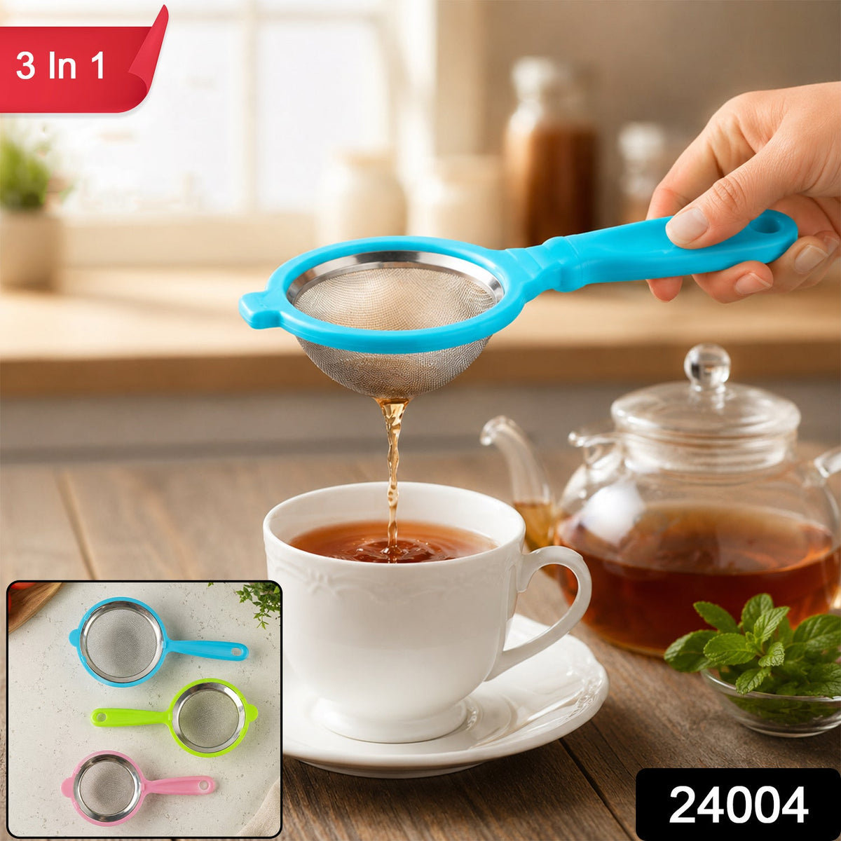 A hand holds a blue tea strainer, pouring tea into a white cup, with a teapot and mint nearby. – view 2