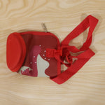 Stylish and functional water bottle carrier sling for outdoor and travel needs