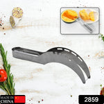 A silver stainless steel watermelon slicer lies on a white wooden surface with herbs and spices around it.