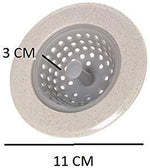 A beige and grey silicone sink strainer basket with measurements of 3 cm height and 11 cm diameter.