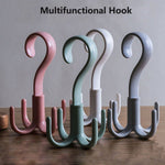 Close-up of the GlimmerHome 4-claw purse hanger hook, highlighting its robust construction.