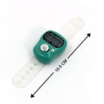 A green digital tally counter with a clear plastic wrist strap is shown with a 10.5 cm measurement arrow.