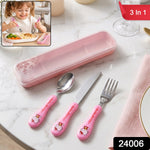 Pink Hello Kitty spoon, knife, and fork next to a pink case, with a child eating in the corner.