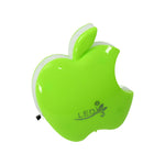 Close-up view of the green apple-shaped LED night light with a small