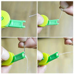 Handheld needle threading device in multicolour actively threading a needle with ease.