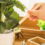 Three pieces of the Kids Garden Tools Set, ready for an exciting day of outdoor gardening.