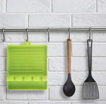 Compact silicone spatula holder and utensil rest for Indian kitchens.