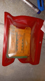 Foldable phone stand holding smartphone vertically in an adjustable position