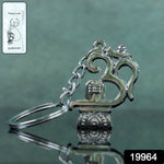 Close-up of Om Shivling keychain with detailed metalwork
