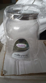 Lifestyle shot of an airtight plastic food storage jar in a modern kitchen setting.