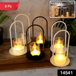 Close-up of plastic flameless LED candle lamps with flickering glow