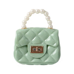 Fashionable quilted mini bag with unique pearl handle detail