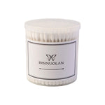 Close-up view of cotton buds showing soft cotton tips for gentle cleaning