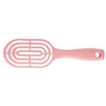 Men's hair brush held comfortably in hand, demonstrating easy grip.