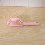Vented design of the hair brush assisting in faster blow-drying.