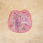 Pink kids stationery set displayed with all included items