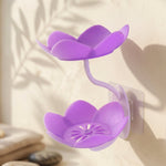 A clean studio shot of the white flower shape double layer plastic soap dish.