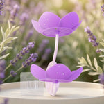 A flower shape wall mounted soap holder installed in a modern bathroom setting.