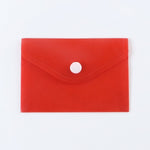 A closed red plastic document folder envelope with a white snap button closure is centered on a plain white background.