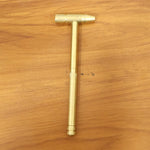 Compact 5-in-1 hammer and screwdriver tool designed for versatile repair tasks