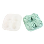Rose shape ice cube tray filled with water and covered with lid