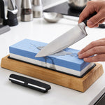 Sharpening a kitchen knife on the whetstone