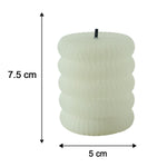 A single cream ribbed LED candle with a black wick is shown with its height and width dimensions.