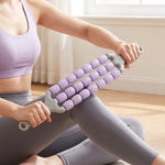Roller massager used on calf muscles
