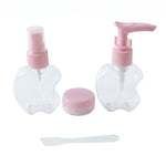 Refillable cosmetic bottle set on white background