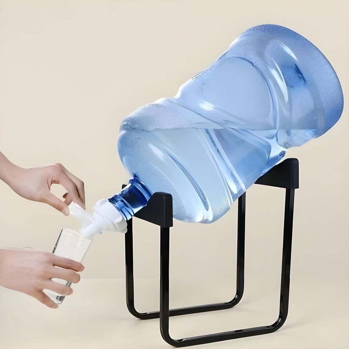 Hands operate a white spigot on a large water bottle, dispensing liquid into a clear glass held by another hand.