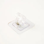 Self-adhesive curtain rail clip installed on wall for lightweight curtains