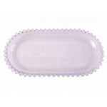 Transparent oval glass tray for serving snacks and sweets
