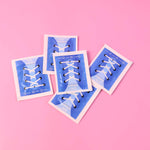 Front view of resealable shoe cleaning wipes packet