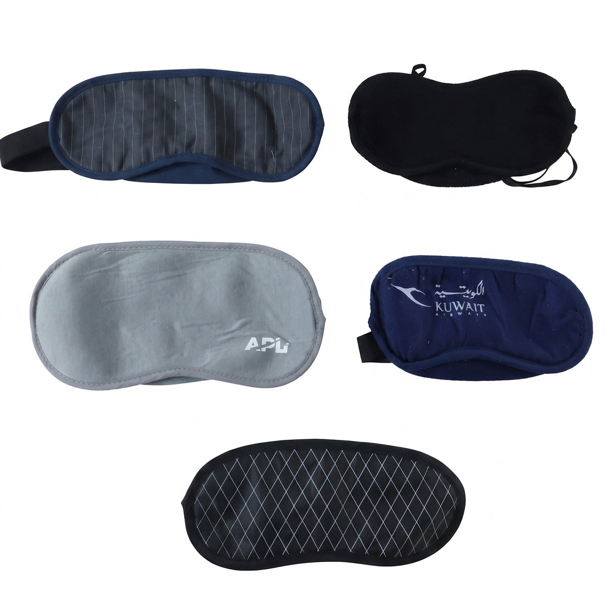 Five different sleeping eye masks are displayed: striped, black, grey with APL logo, navy with Kuwait Airways logo, and