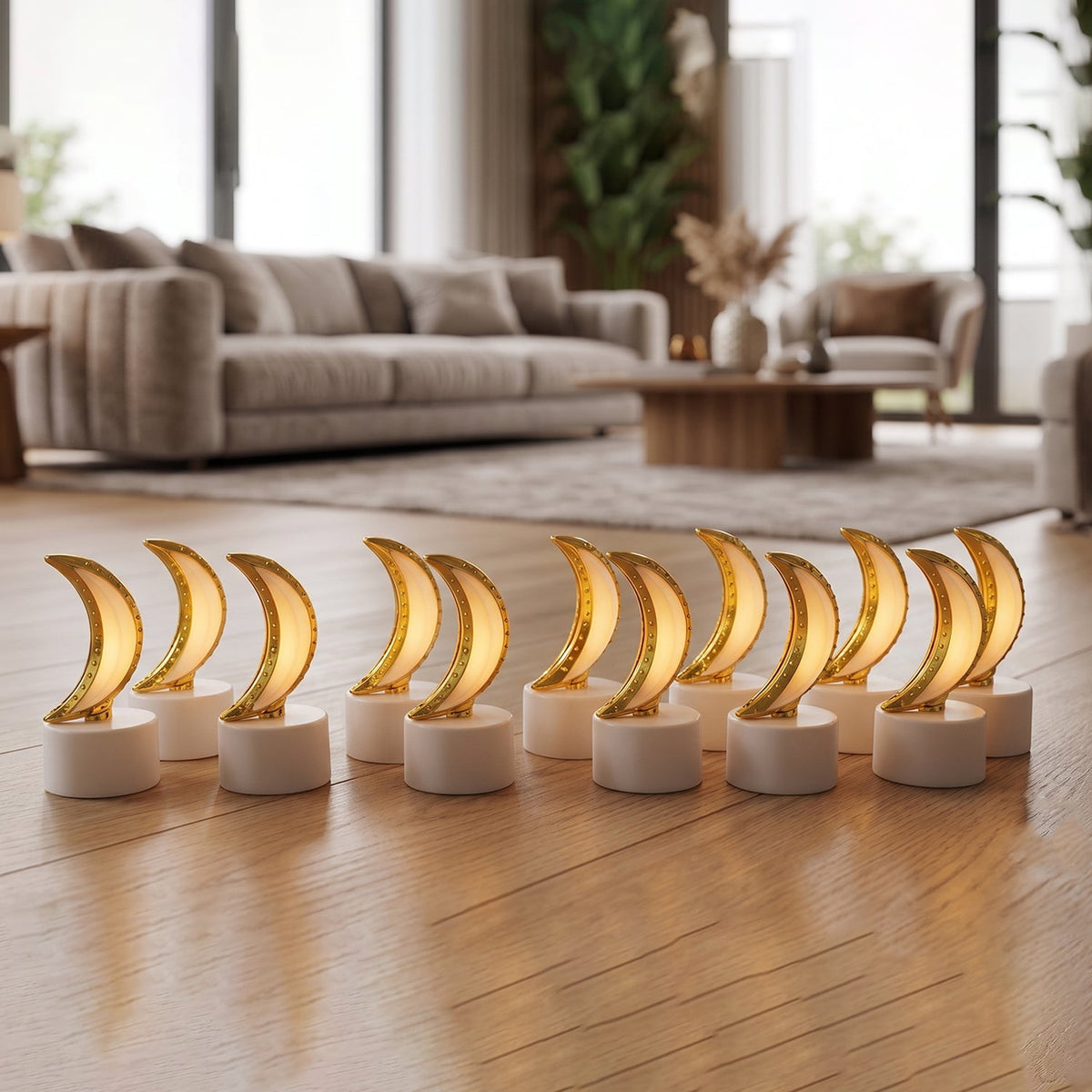 Twelve golden crescent moon LED tealights with warm glow on a wooden floor in a living room